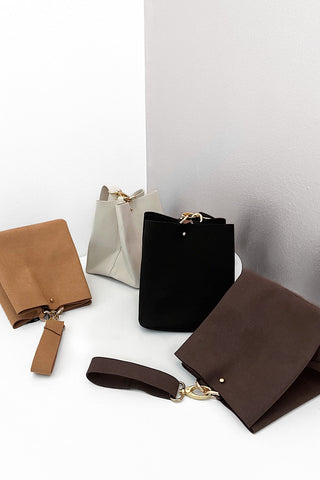One-Of-A-Kind Suede Wristlet Bags